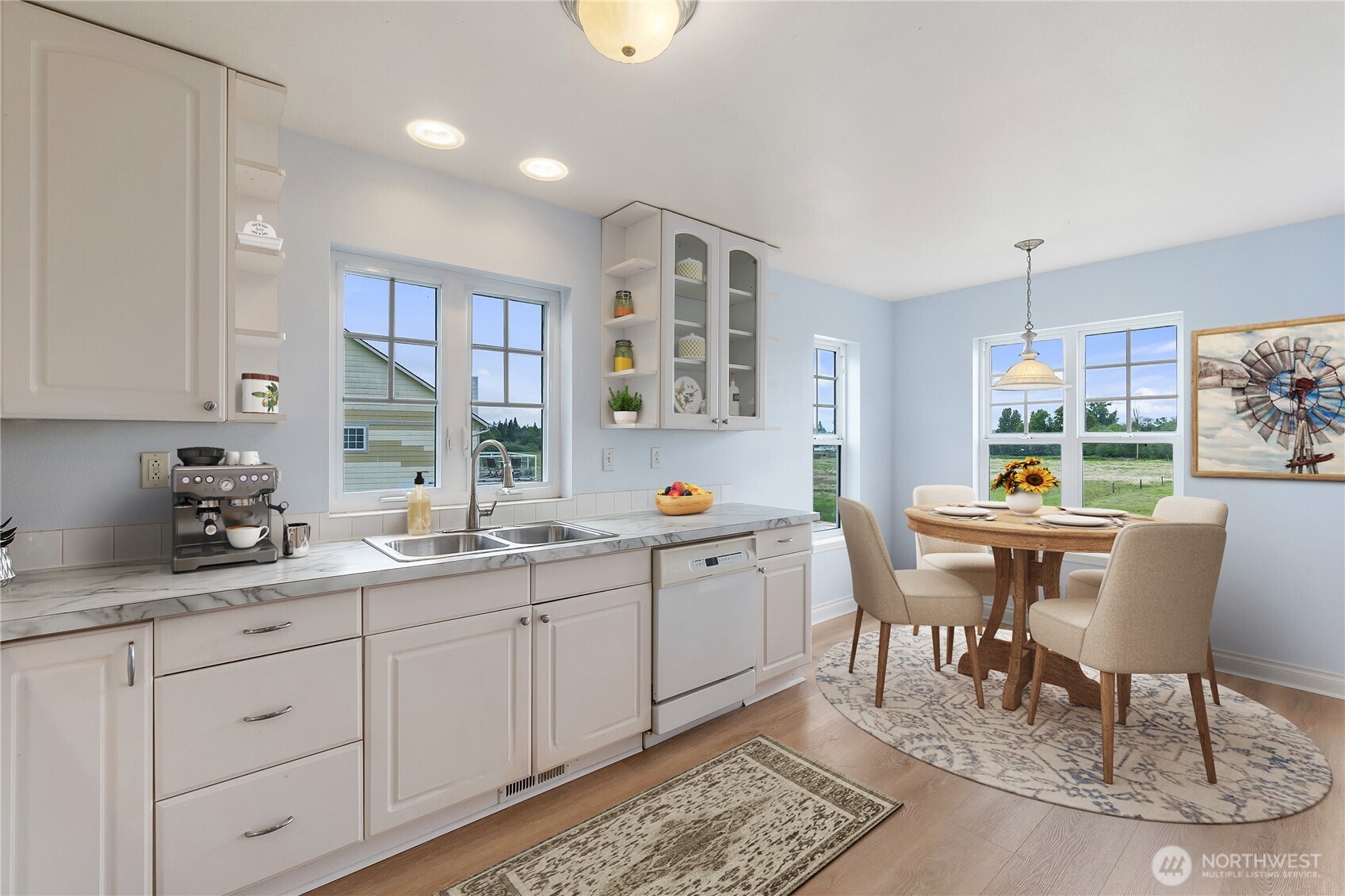 101 Briar Rose Lane Chehalis, WA 98532 - Photo 16 of 37 a kitchen with white cabinets and chairs