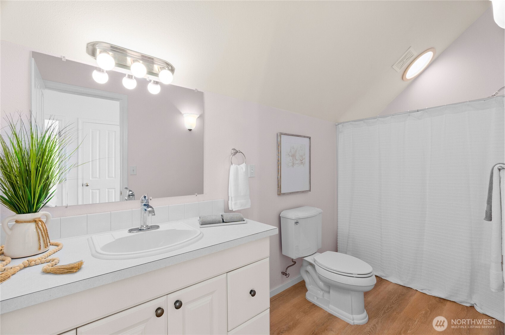 101 Briar Rose Lane Chehalis, WA 98532 - Photo 27 of 40 a bathroom with a toilet a sink and mirror