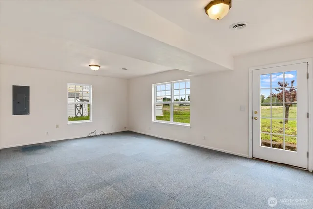 an empty room with windows