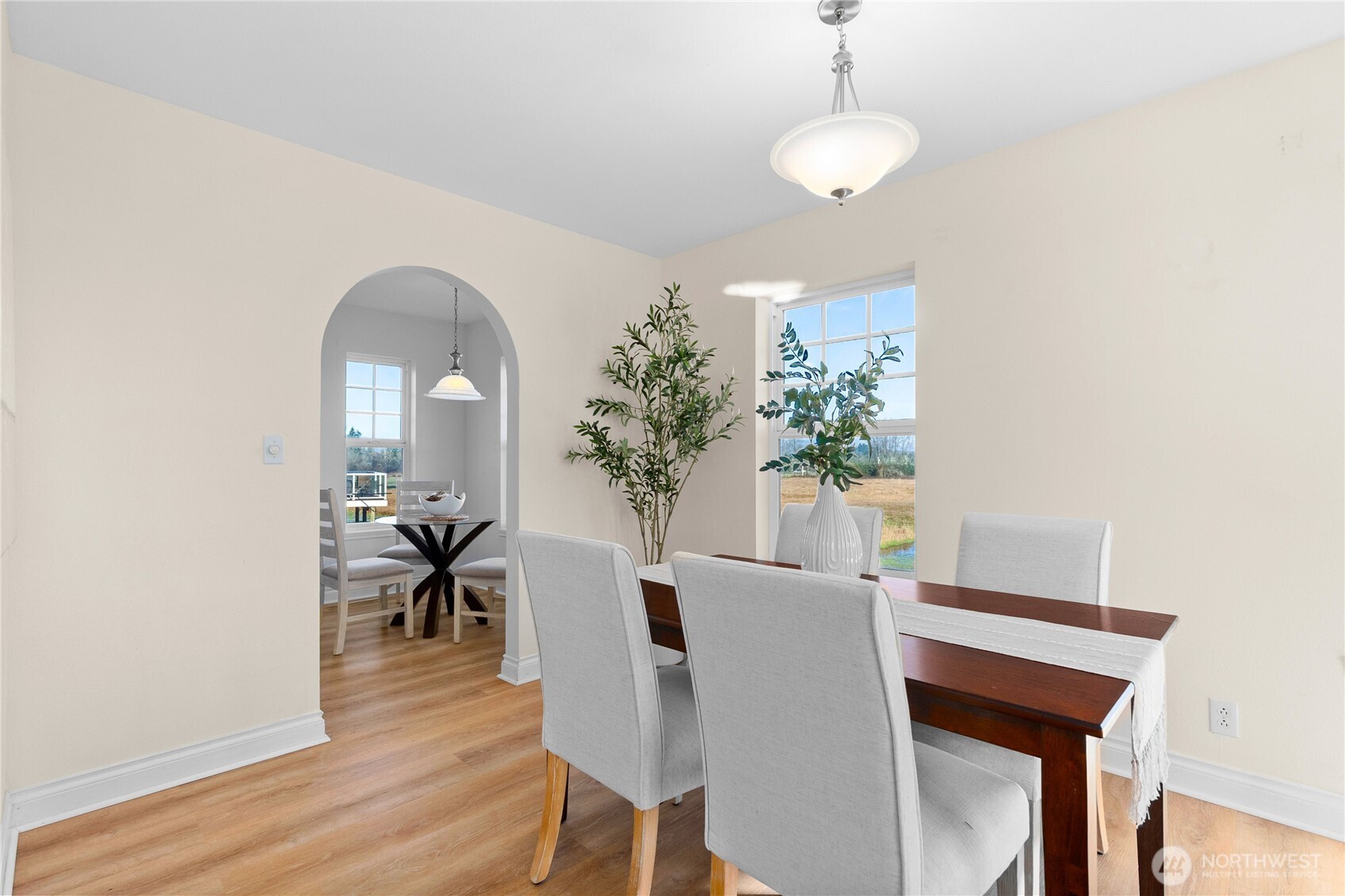 101 Briar Rose Lane Chehalis, WA 98532 - Photo 10 of 40 a dining room with furniture potted plants and wooden floor