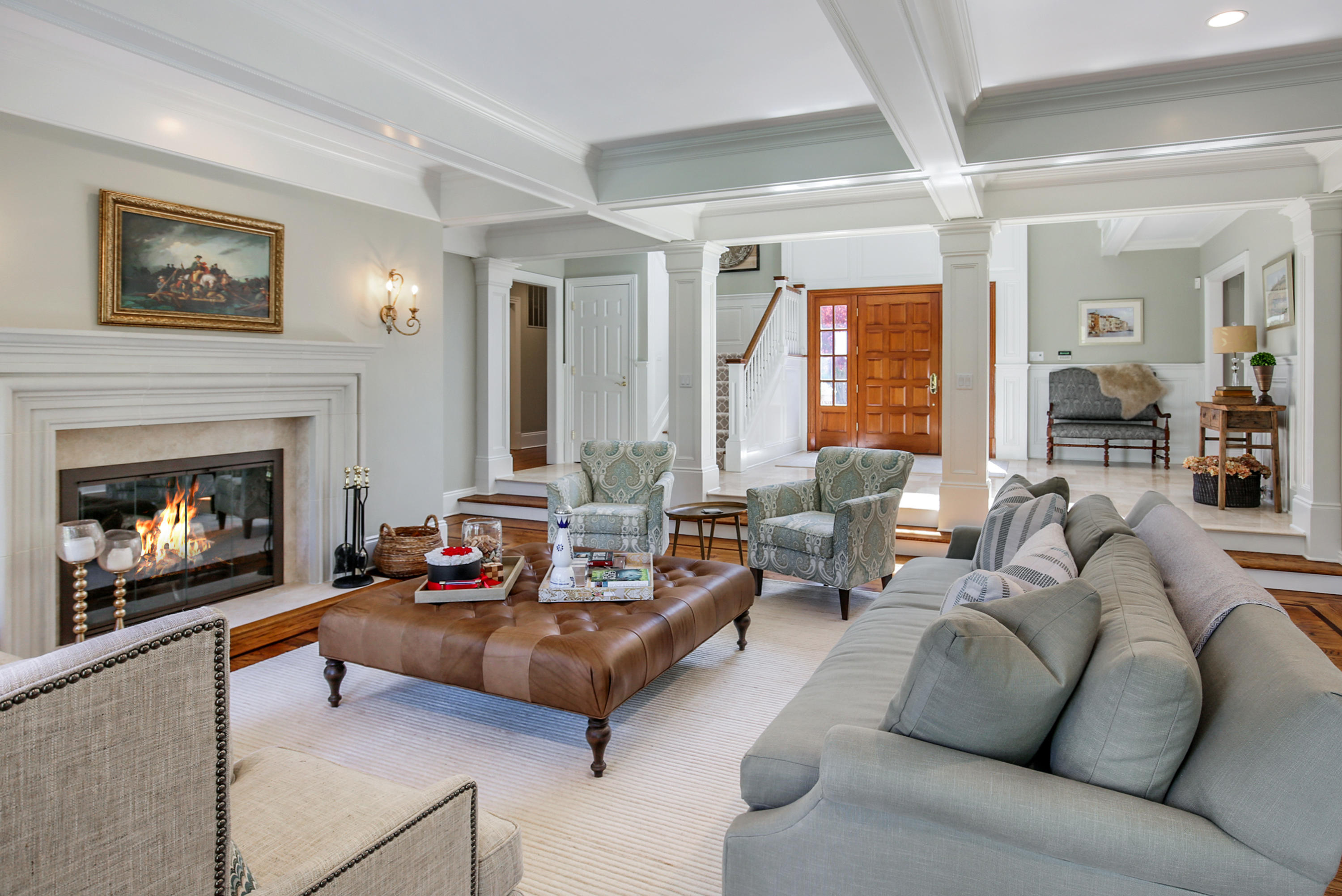 16 Chieftans Road Greenwich, CT 06831 - Photo 4 of 28 a living room with furniture and a fireplace