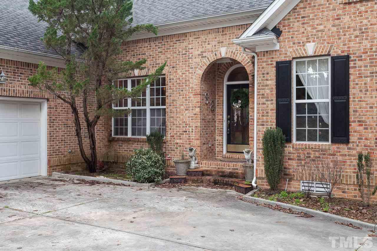 3400 Edgemont Drive Raleigh, NC 27612 - Photo 2 of 22 a front view of a house with garden