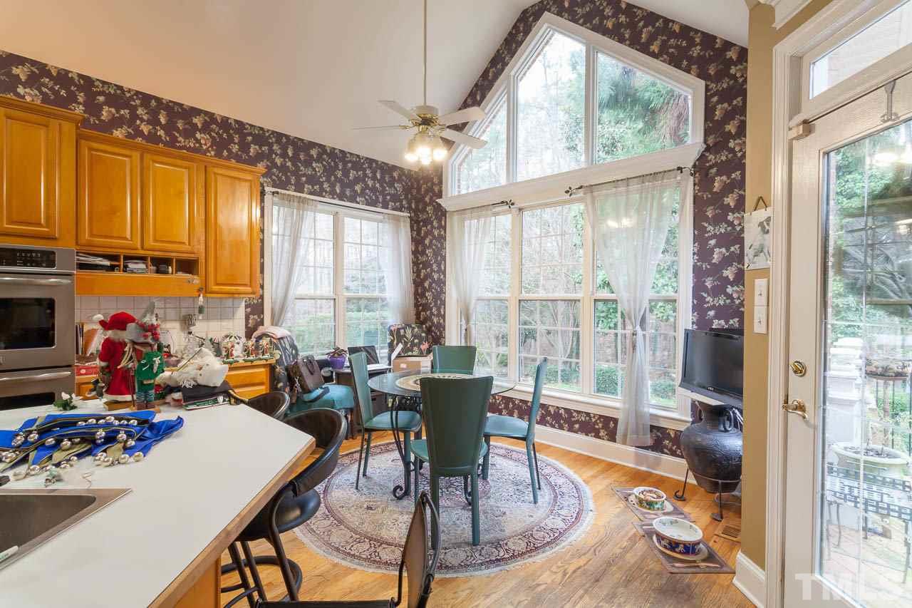 3400 Edgemont Drive Raleigh, NC 27612 - Photo 5 of 22 a very nice looking living room with a large window and dining table
