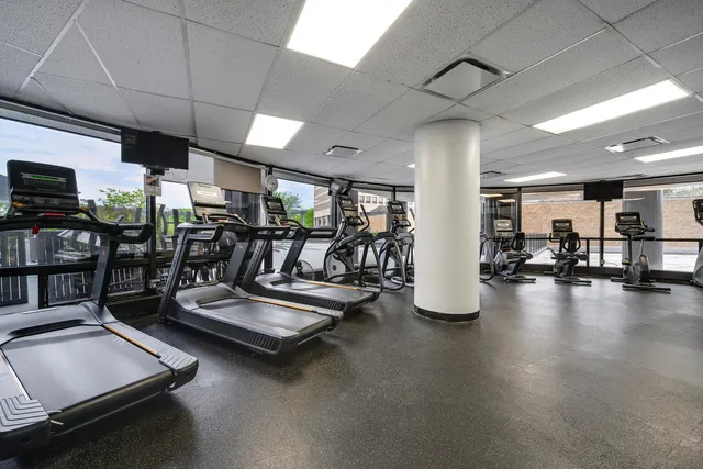 a view of a room with gym equipment