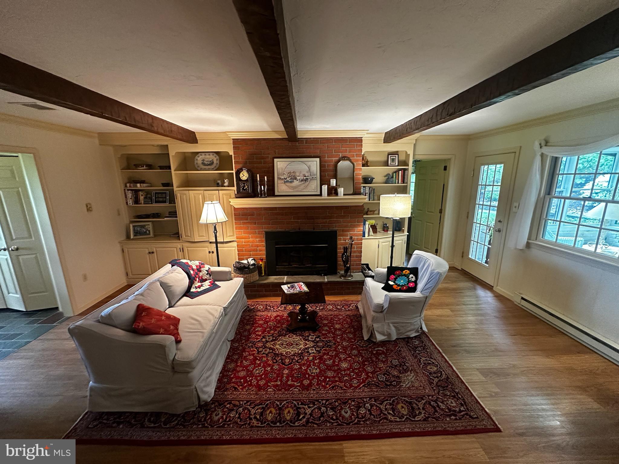 105 Northview Road Lititz, PA 17543 - Photo 21 of 38 a living room with furniture and a fireplace