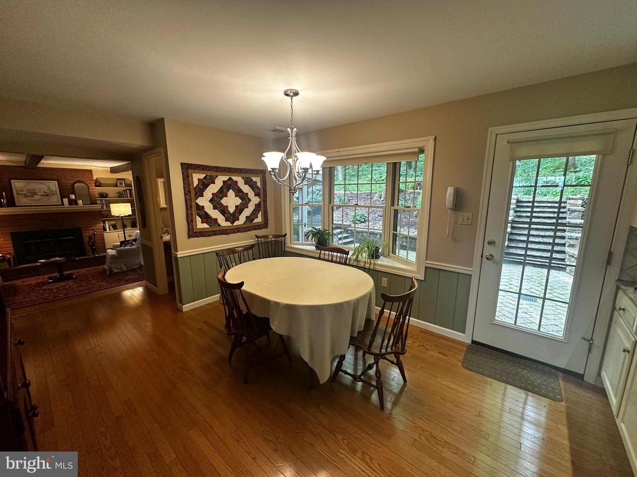 105 Northview Road Lititz, PA 17543 - Photo 24 of 38 a view of a dining room with furniture window and wooden floor
