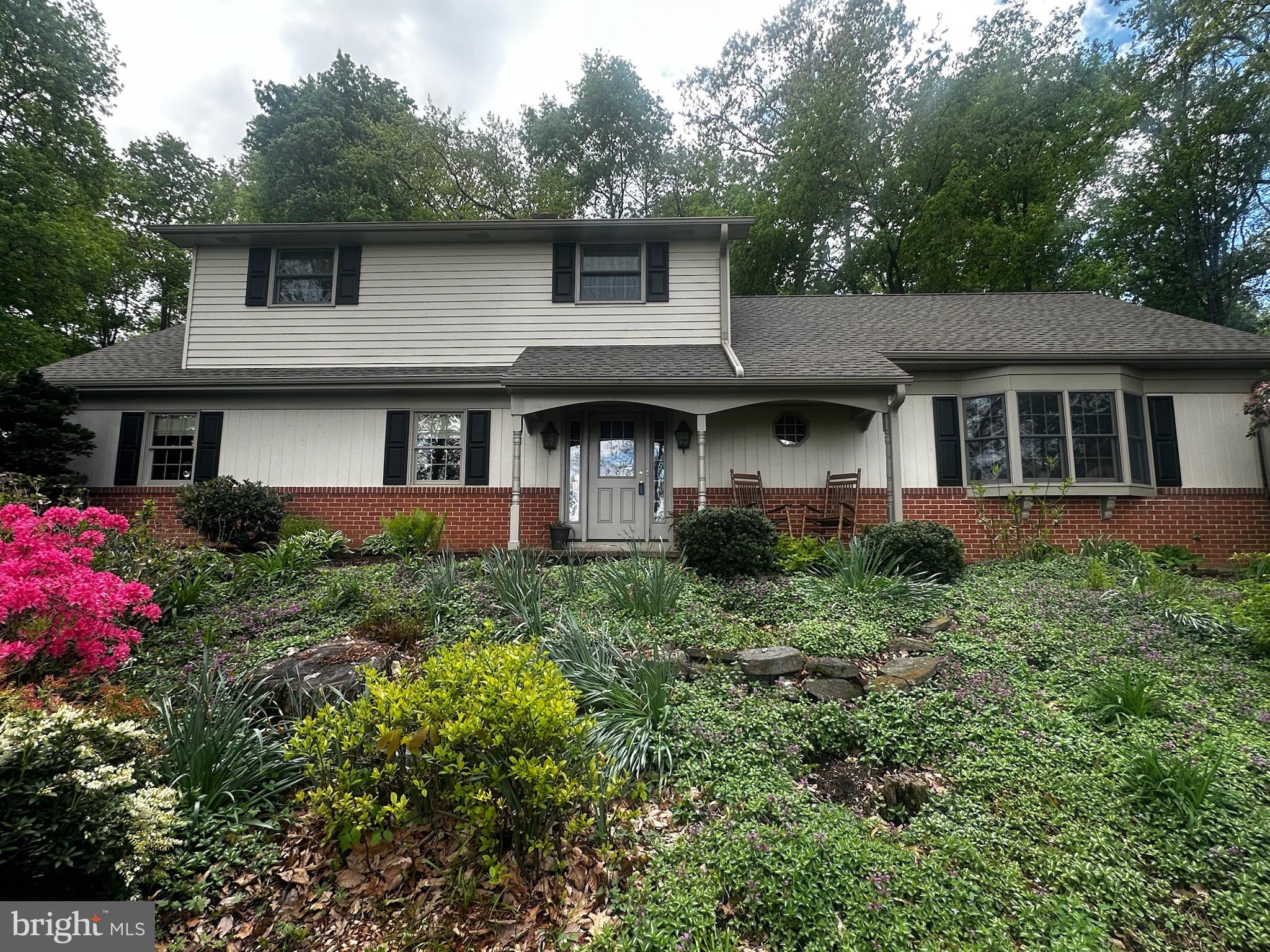 105 Northview Road Lititz, PA 17543 - Photo 3 of 38 a front view of a house with a yard