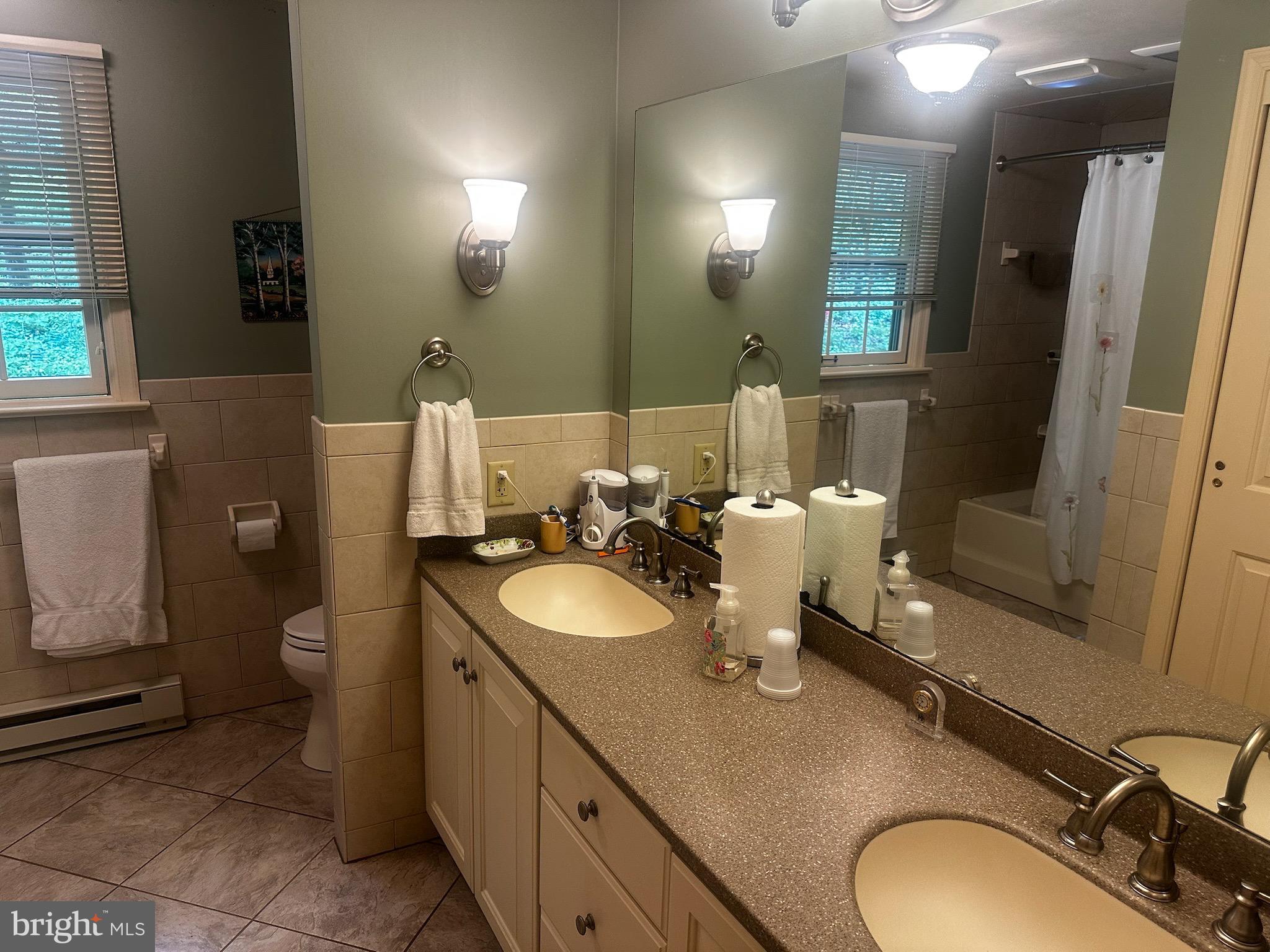 105 Northview Road Lititz, PA 17543 - Photo 34 of 38 a bathroom with a toilet sink and mirror
