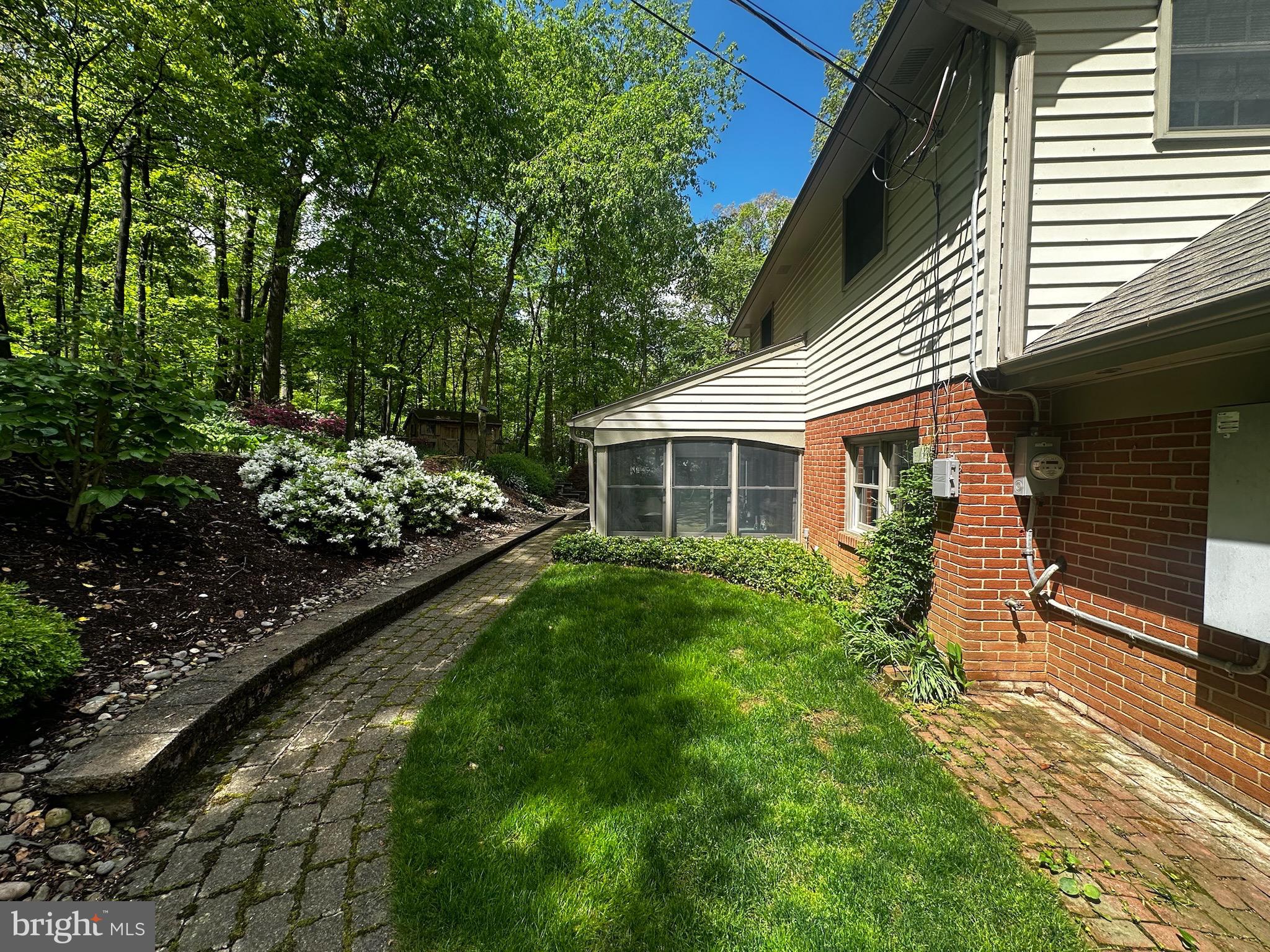 105 Northview Road Lititz, PA 17543 - Photo 4 of 38 a front view of a house with a yard