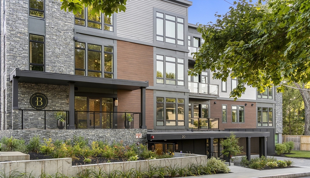 20 Kinmonth Road, Unit 4 Newton, MA 02468 - Photo 10 of 12 front view of house with a street