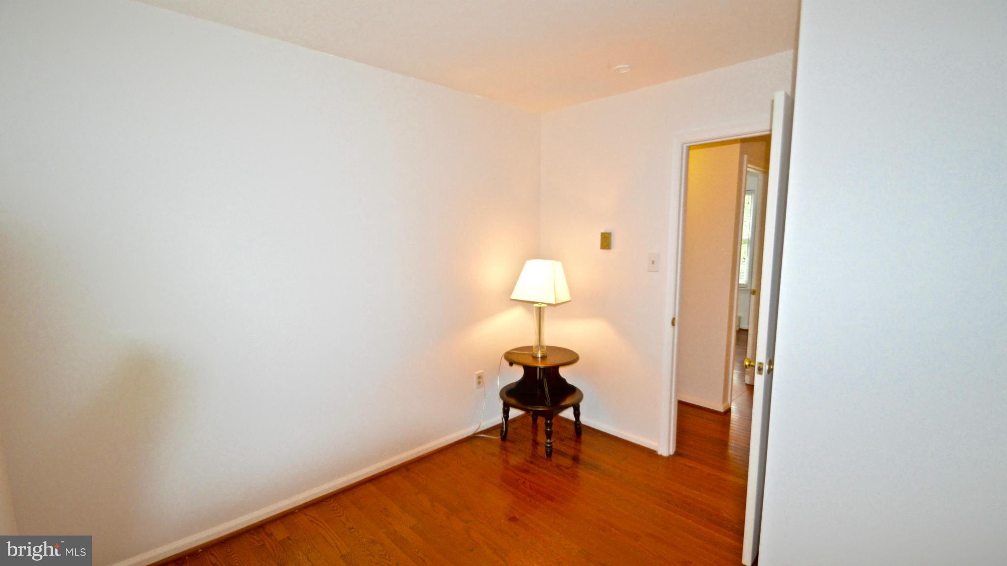 3827 Pippins Place Point of Rocks, MD 21777 - Photo 12 of 22 a view of a room with a wooden floor and a window