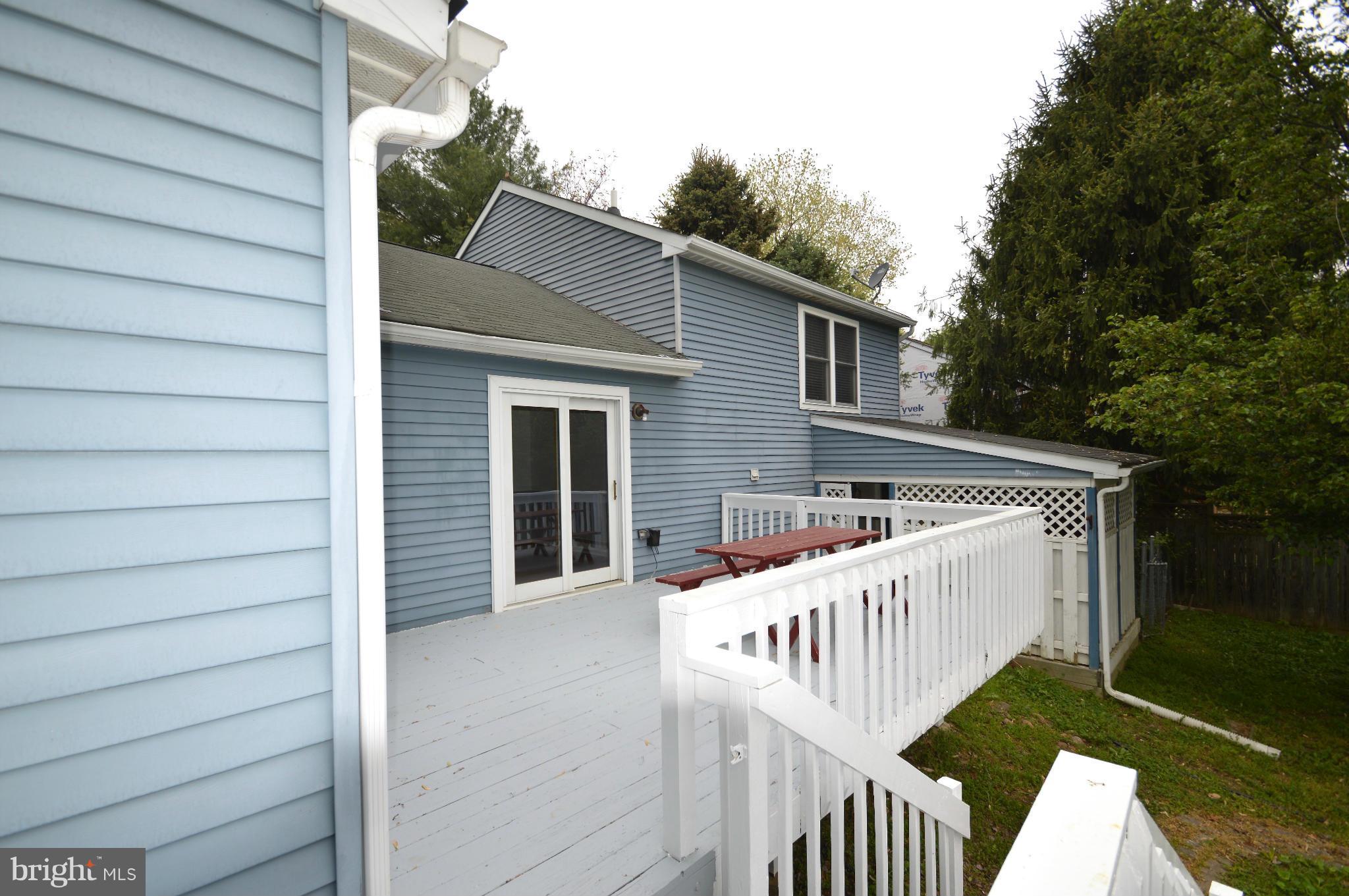 3827 Pippins Place Point of Rocks, MD 21777 - Photo 21 of 22 a view of deck with wooden fence and floor to ceiling window
