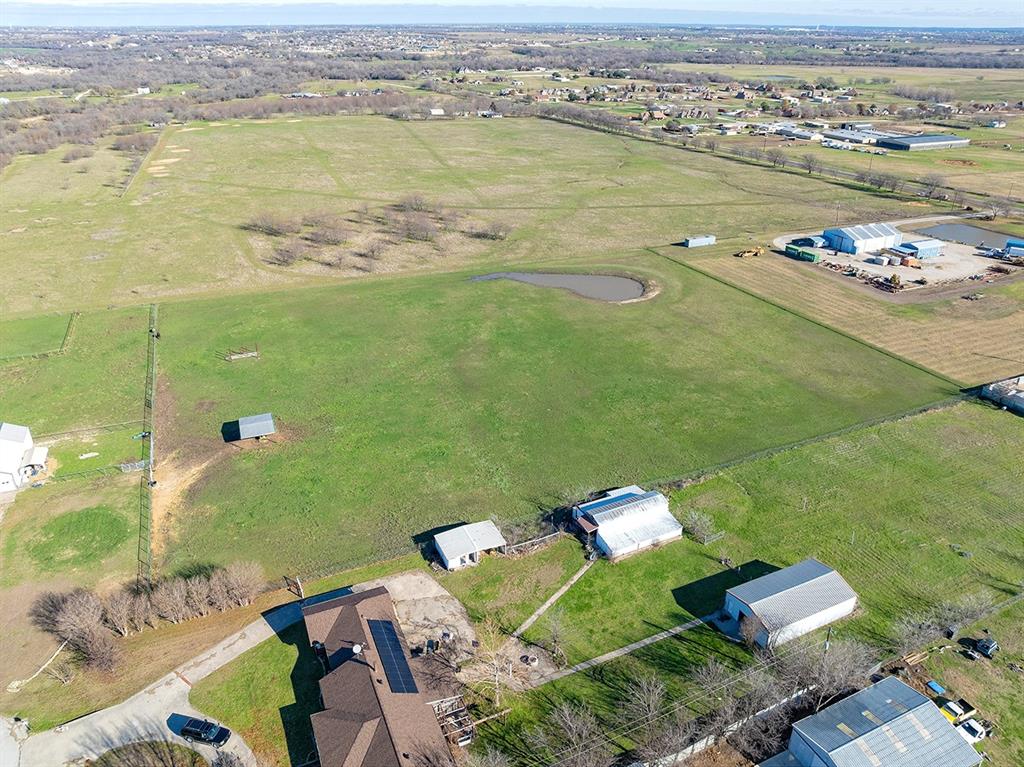 14158 Crest View Road Sanger, TX 76266 - Photo 5 of 13 an aerial view of a house with a ocean view