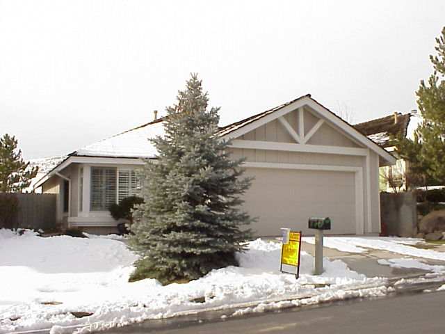 2940 Alpine Creek Road Reno, NV 89519 - Photo 1 of 1 a front view of a house with a yard