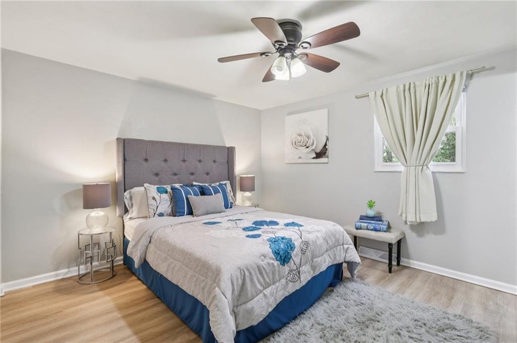 151 McIntyre Road Pittsburgh, PA 15237 - Photo 16 of 50 Primary bedroom with ceiling fan and new LVP flooring
