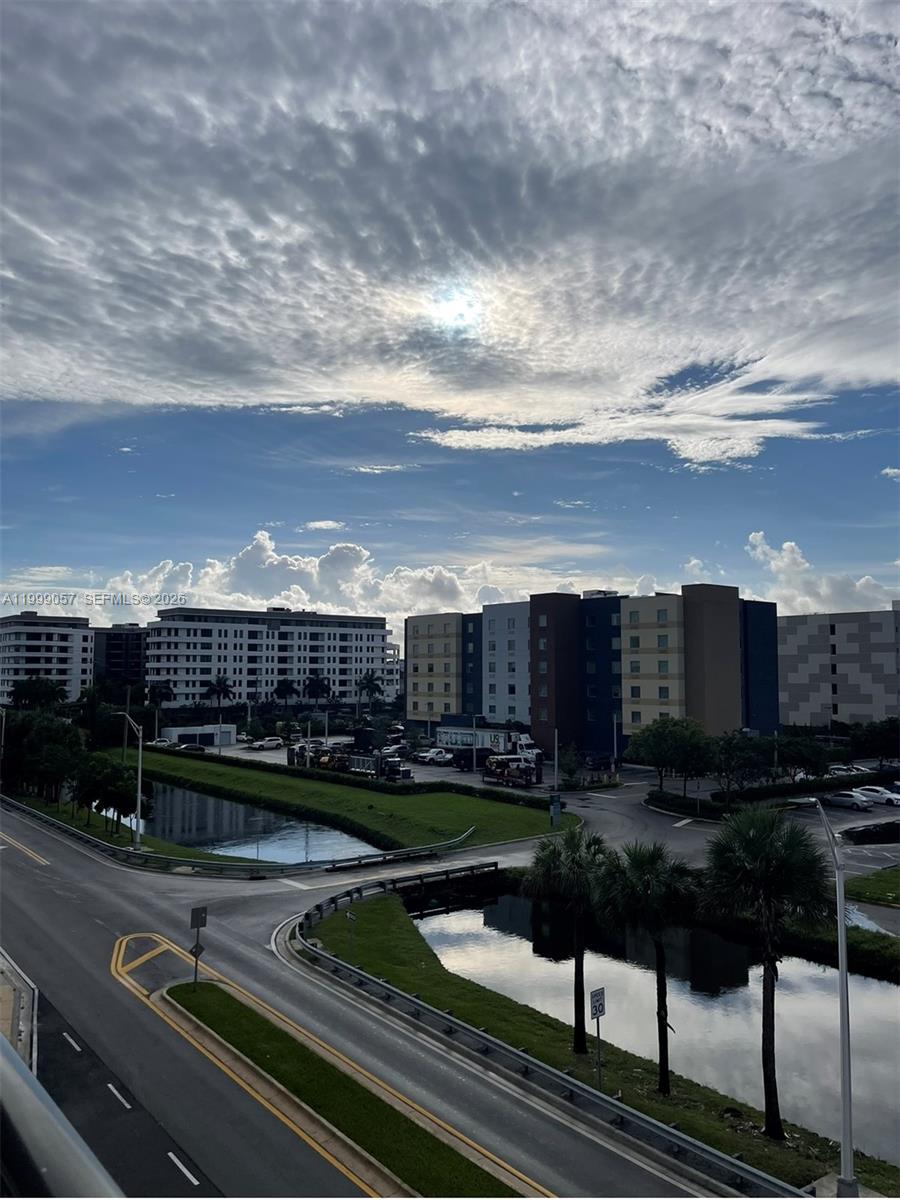 8167 Northwest 41st Street, Unit E409 Doral, FL 33166 - Photo 15 of 30 a view of a city with lots of buildings