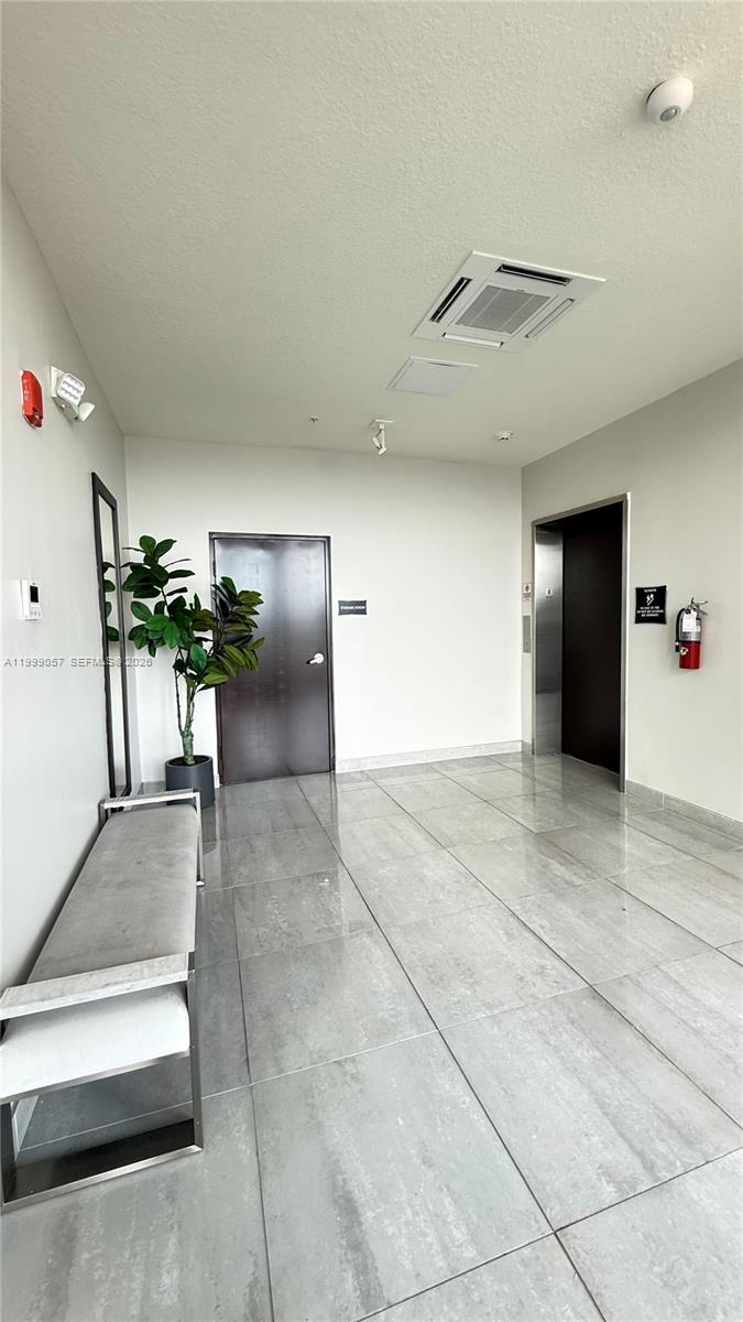8167 Northwest 41st Street, Unit E409 Doral, FL 33166 - Photo 28 of 30 a view of livingroom with furniture
