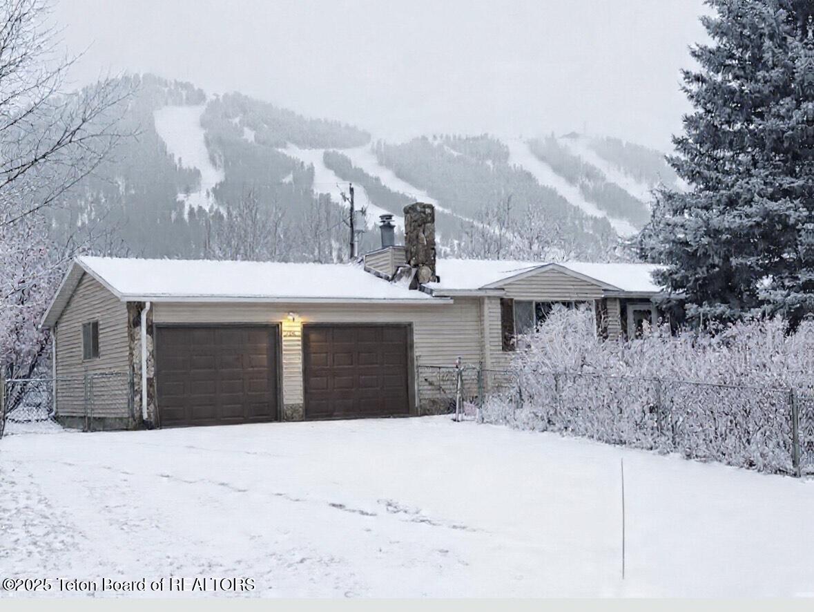 700 Pearl Street Jackson, WY 83001 - Photo 2 of 47 front with light snow