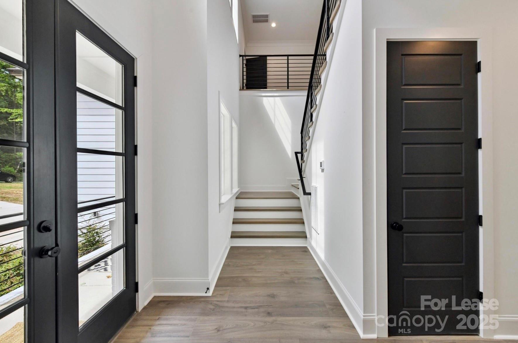3830 Mill Run Terrell, NC 28682 - Photo 18 of 32 a view of entryway and hall with wooden floor