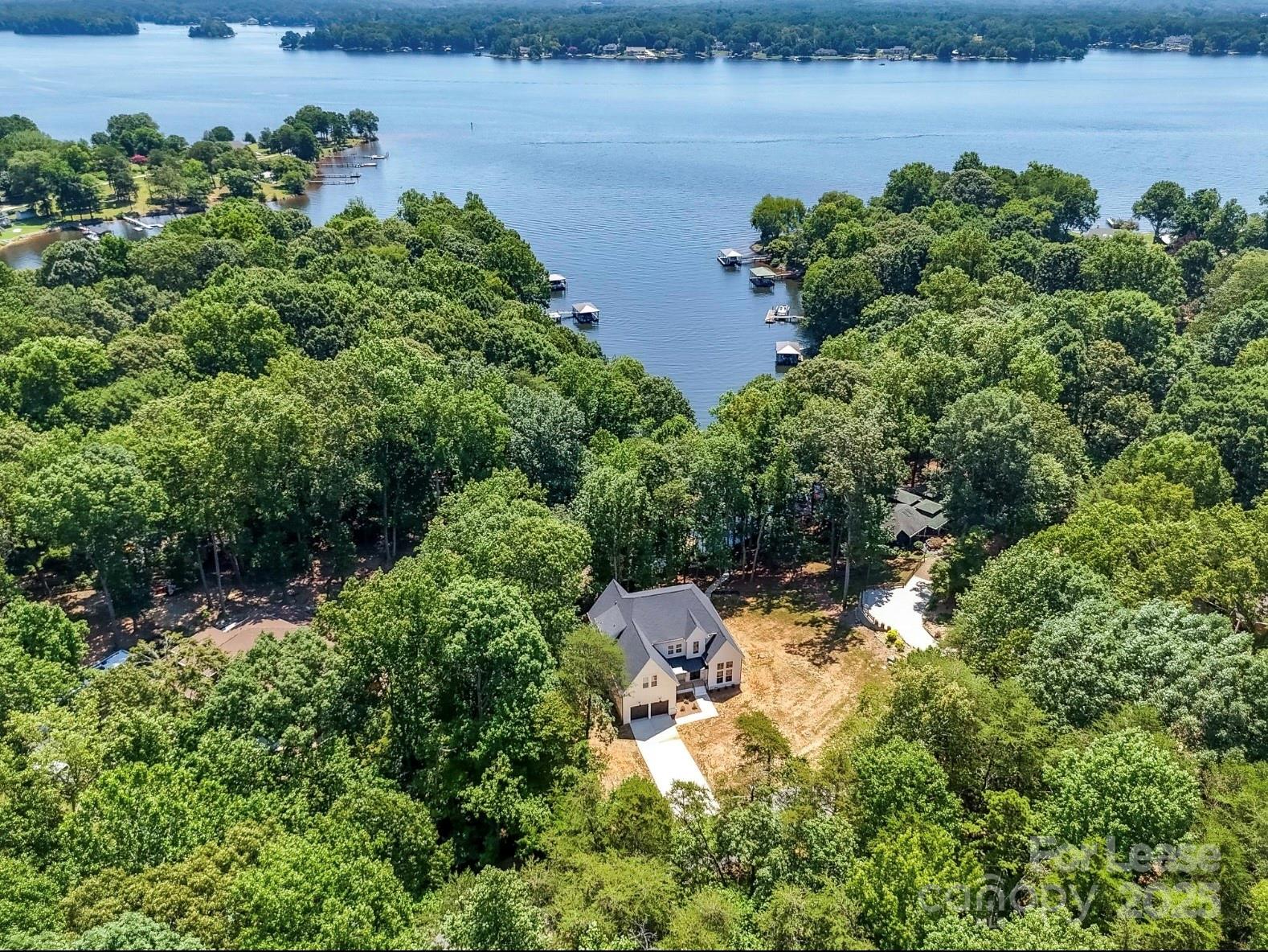 3830 Mill Run Terrell, NC 28682 - Photo 31 of 32 an aerial view of a house with a yard and lake view