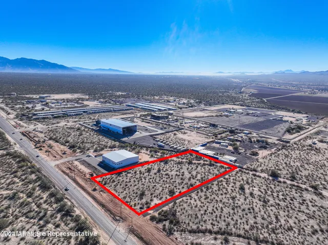 an aerial view of beach and ocean