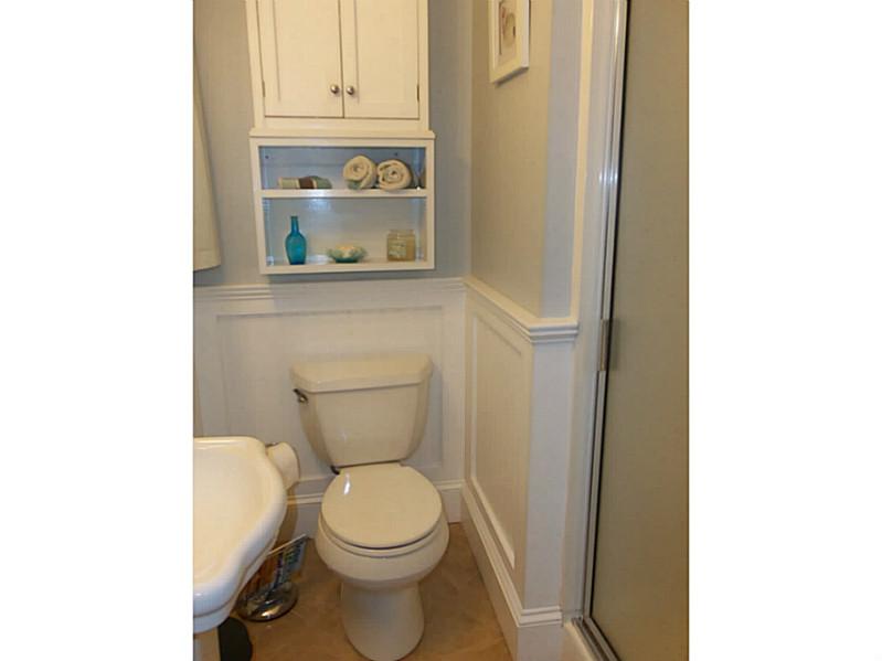 171 Valley Road Middletown, RI 02842 - Photo 17 of 25 Master Bath/Spa. Renovated Master Bath includes tile floor, new sink, toilet , beadboard and lightening
