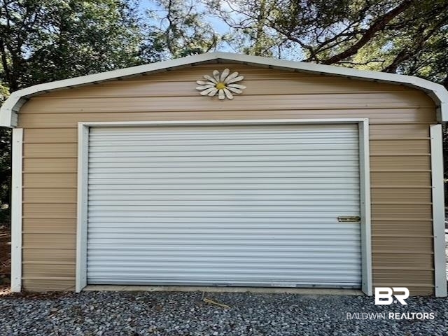 1411 Ridgewood Drive Lillian, AL 36549 - Photo 29 of 30 View of outbuilding featuring a garage