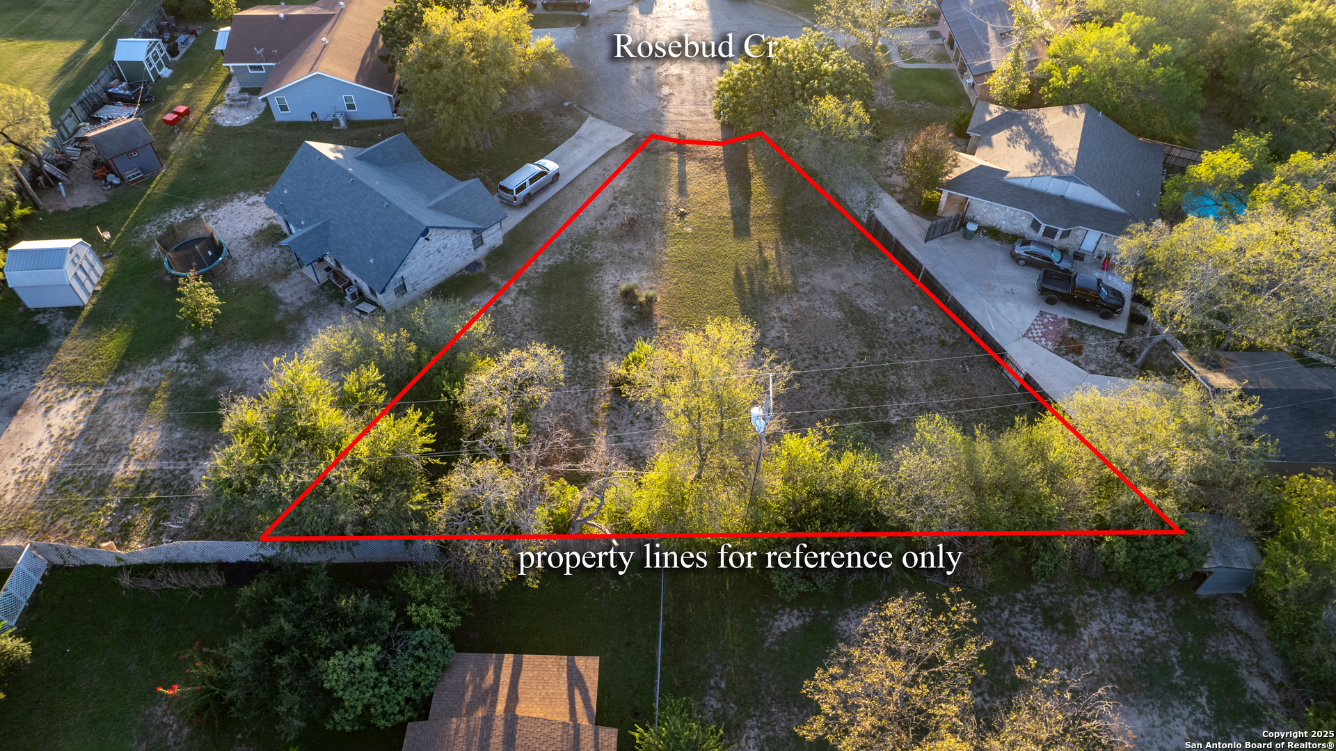 11 Rosebud Circle Uvalde, TX 78801 - Photo 2 of 9 an aerial view of a houses with swimming pool