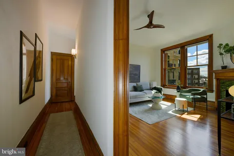 a view of a living room and dining room