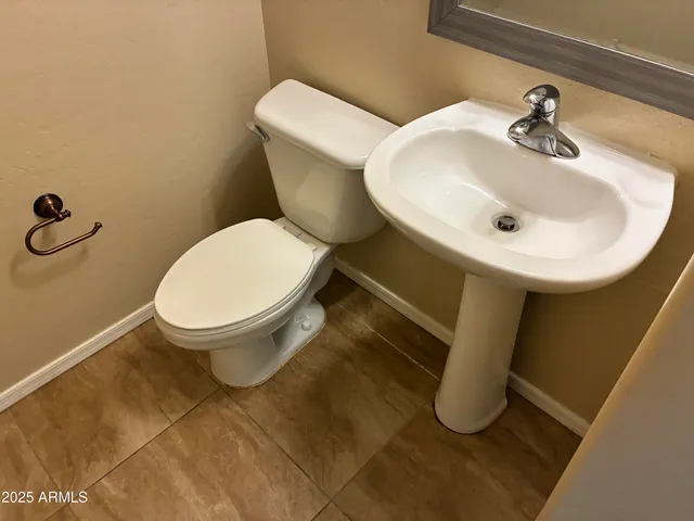a bathroom with a sink and a toilet