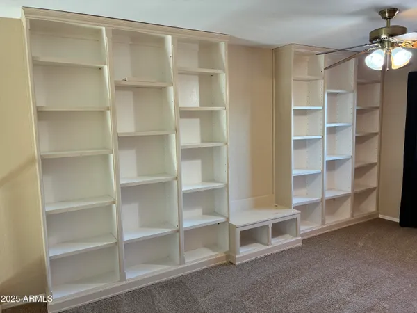 a view of an empty room with empty racks