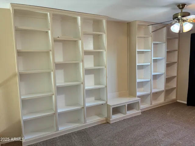 a view of an empty room with empty racks