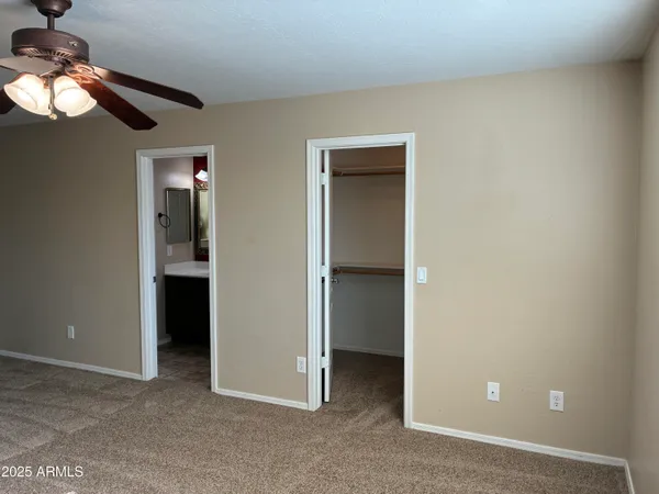 an empty room with a bathroom