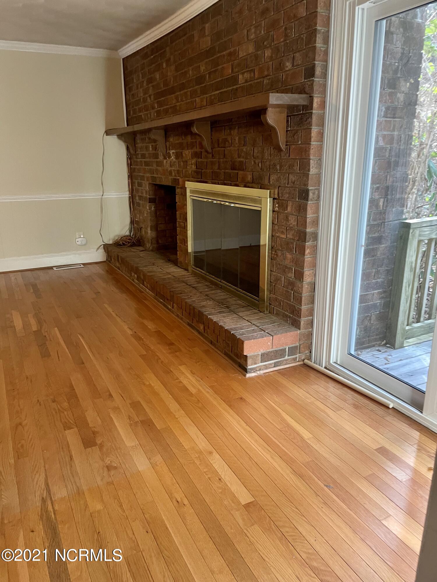318 King George Road Greenville, NC 27858 - Photo 8 of 25 Den Fireplace