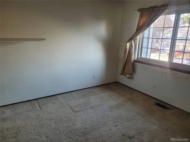 an empty room with a window