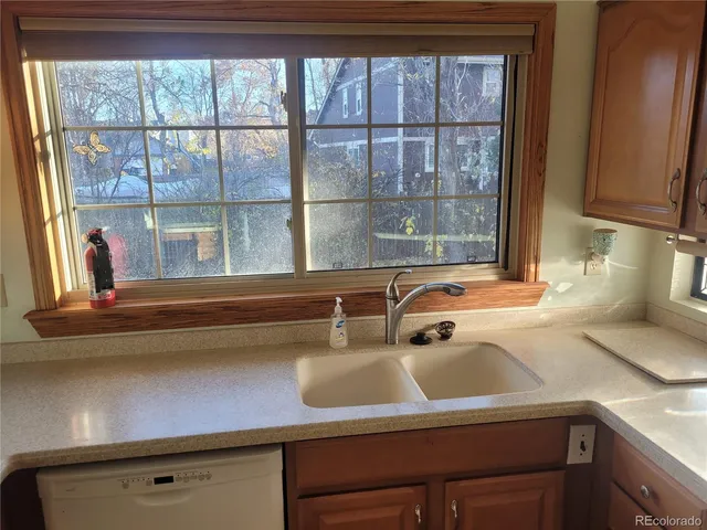 a bathroom with a sink and a window