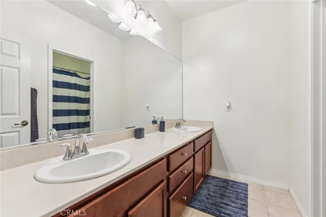 a bedroom with a large bed and a large window