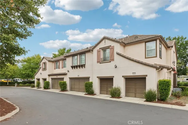 a view of a swimming pool with a yard