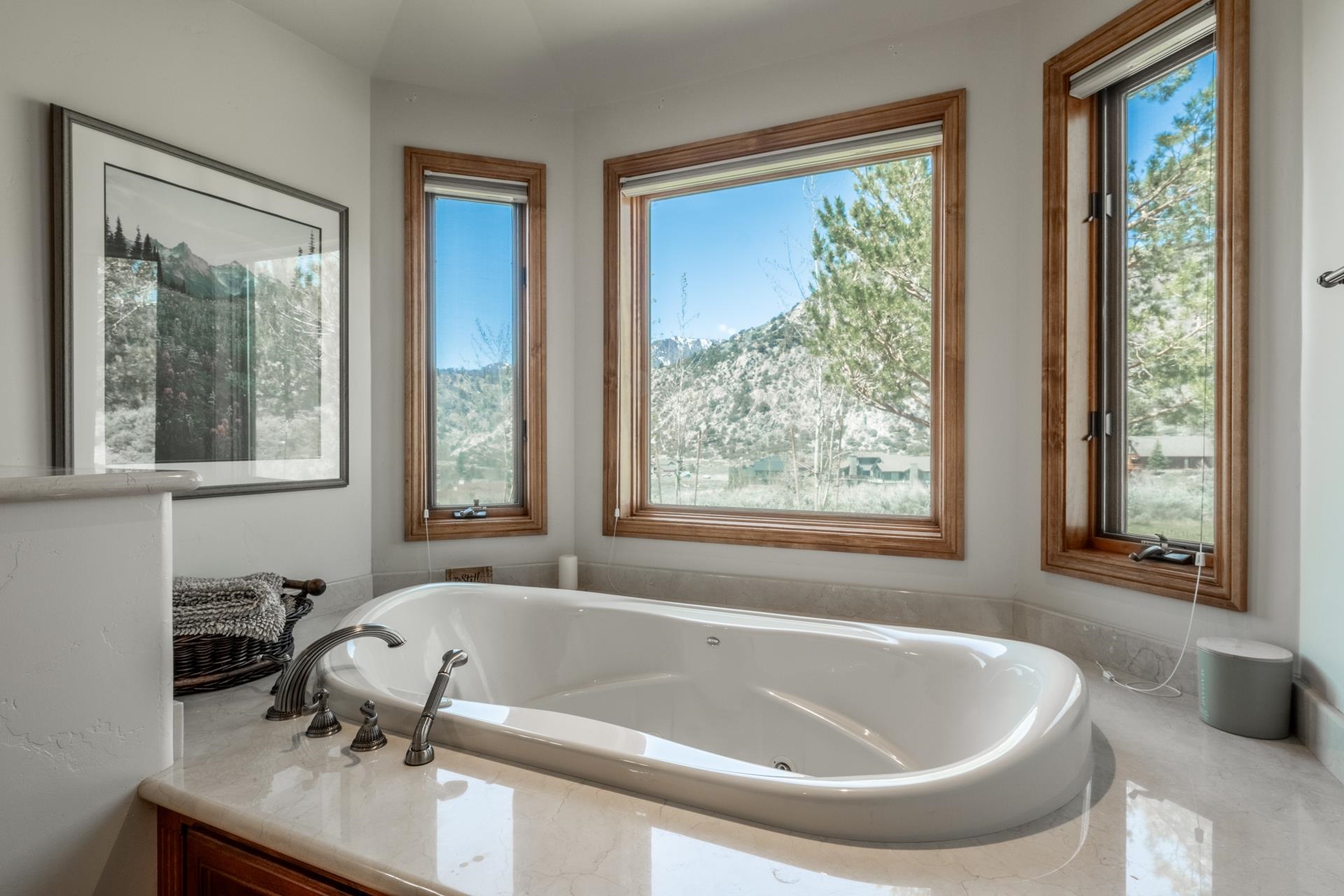 45 Skyline Road June Lake, CA 93529 - Photo 27 of 58 a bath tub sitting in a bathroom next to a window