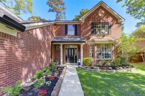 a front view of a house with a porch