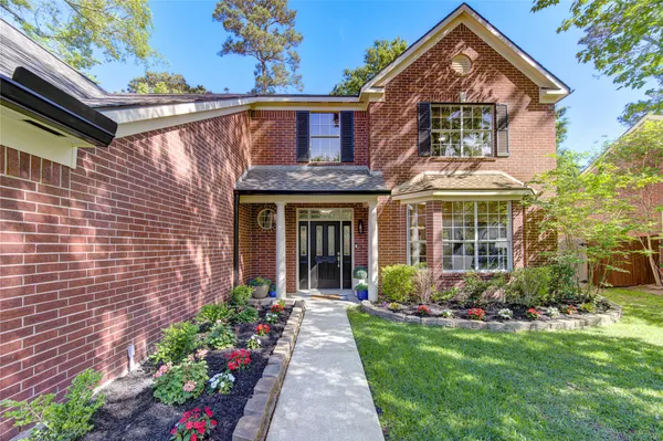 a front view of a house with a porch