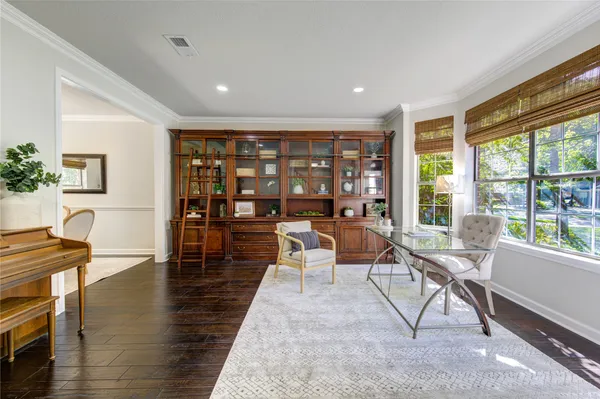 a kitchen with stainless steel appliances granite countertop sink stove top oven and cabinets
