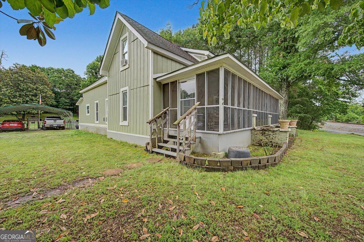 483 Coal Road Northwest Resaca, GA 30735 - Photo 6 of 56 a view of a house with a yard