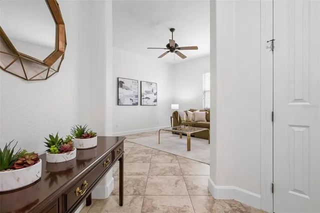 a view of swimming pool with a patio