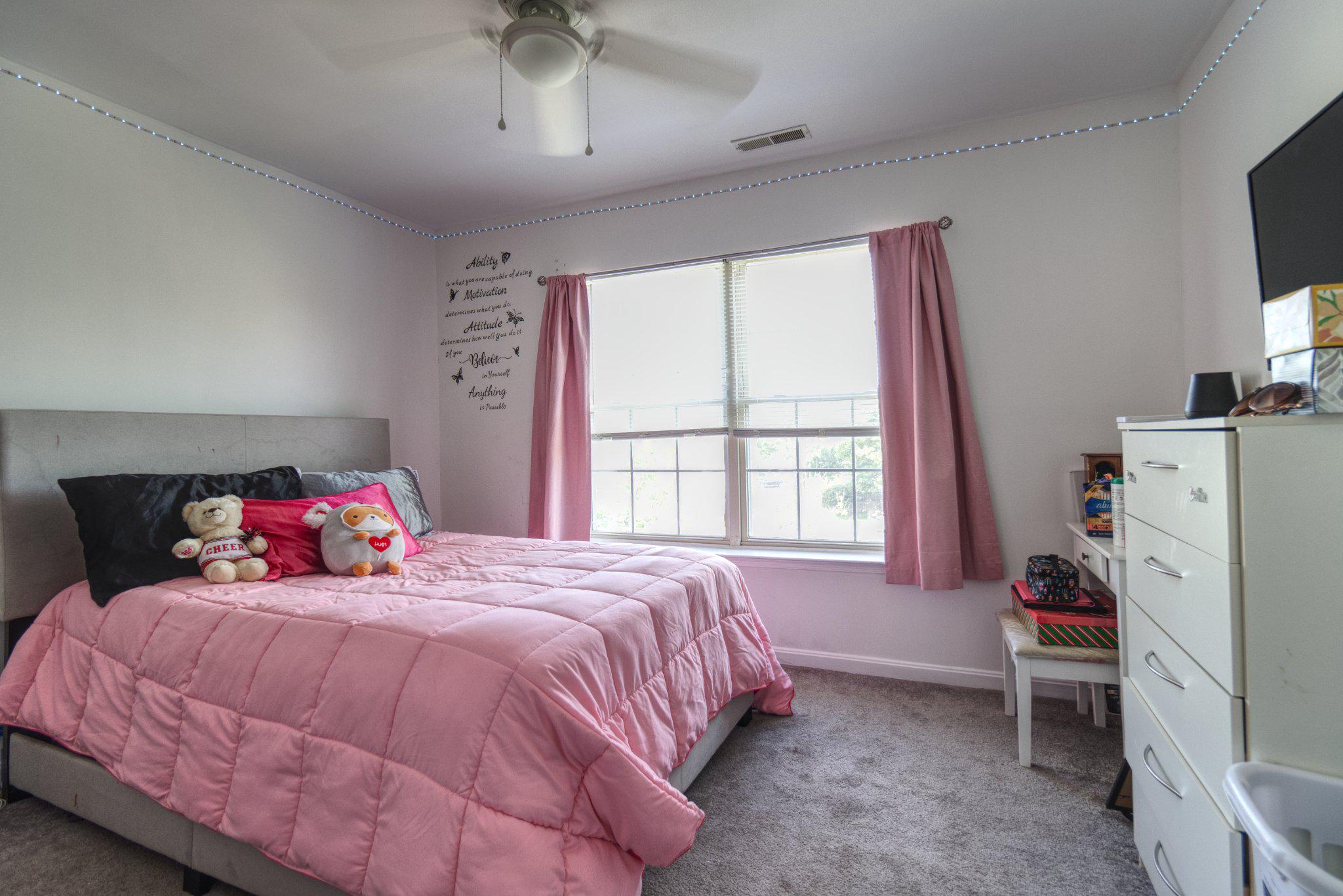 215 Seamaster Road Essex, MD 21221 - Photo 24 of 40 Charming bedroom with soft pink accents.
