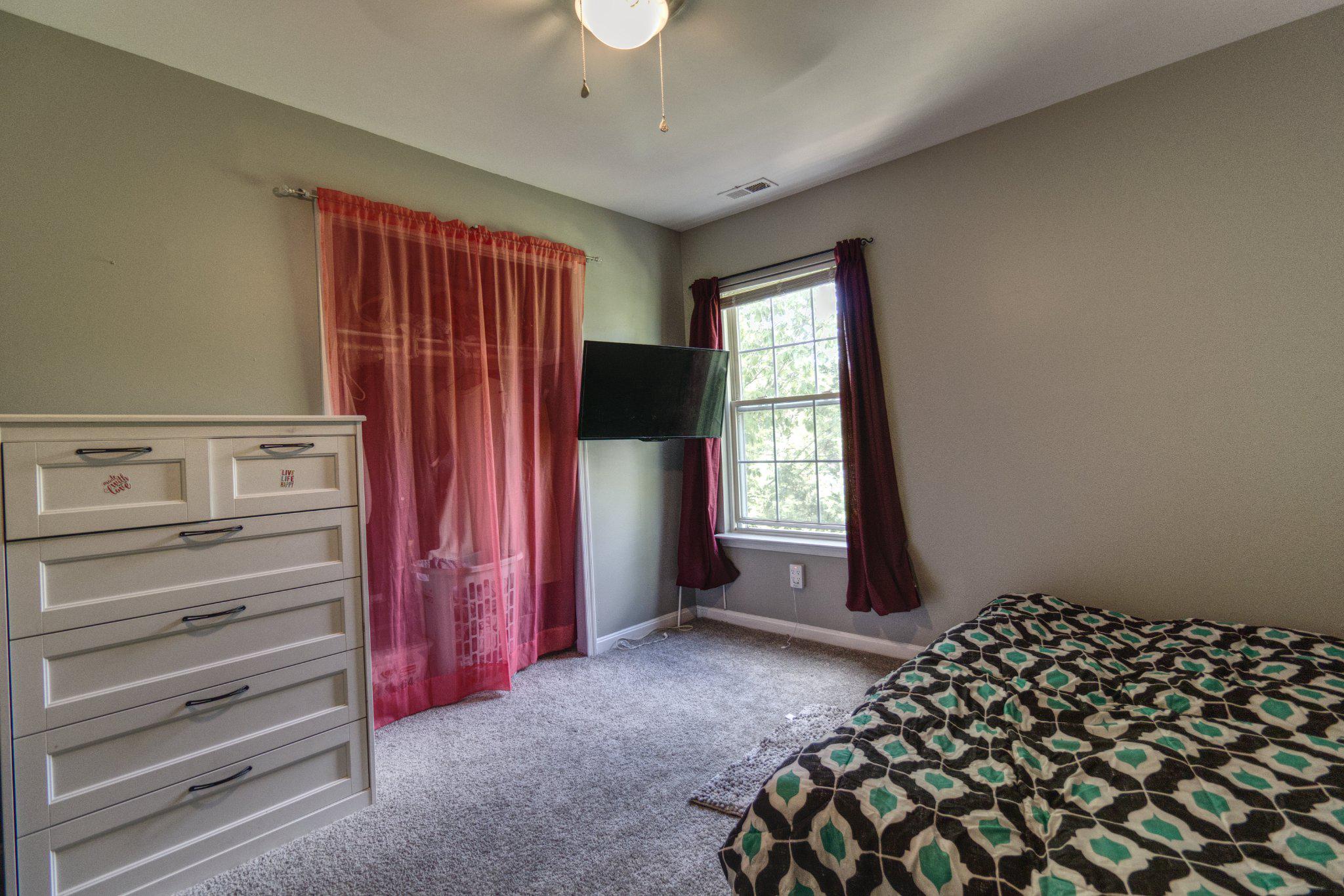 215 Seamaster Road Essex, MD 21221 - Photo 26 of 40 Cozy bedroom with natural light.