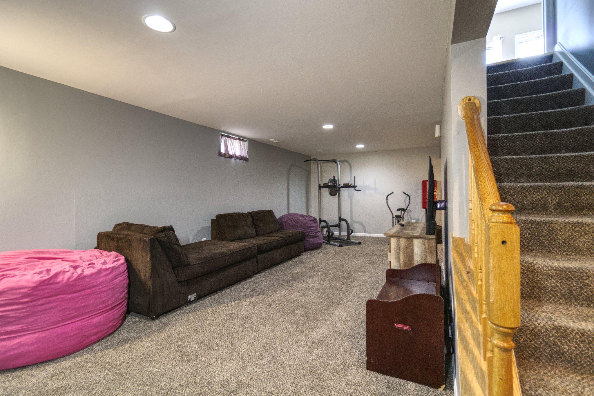 215 Seamaster Road Essex, MD 21221 - Photo 28 of 40 Versatile basement retreat for leisure.