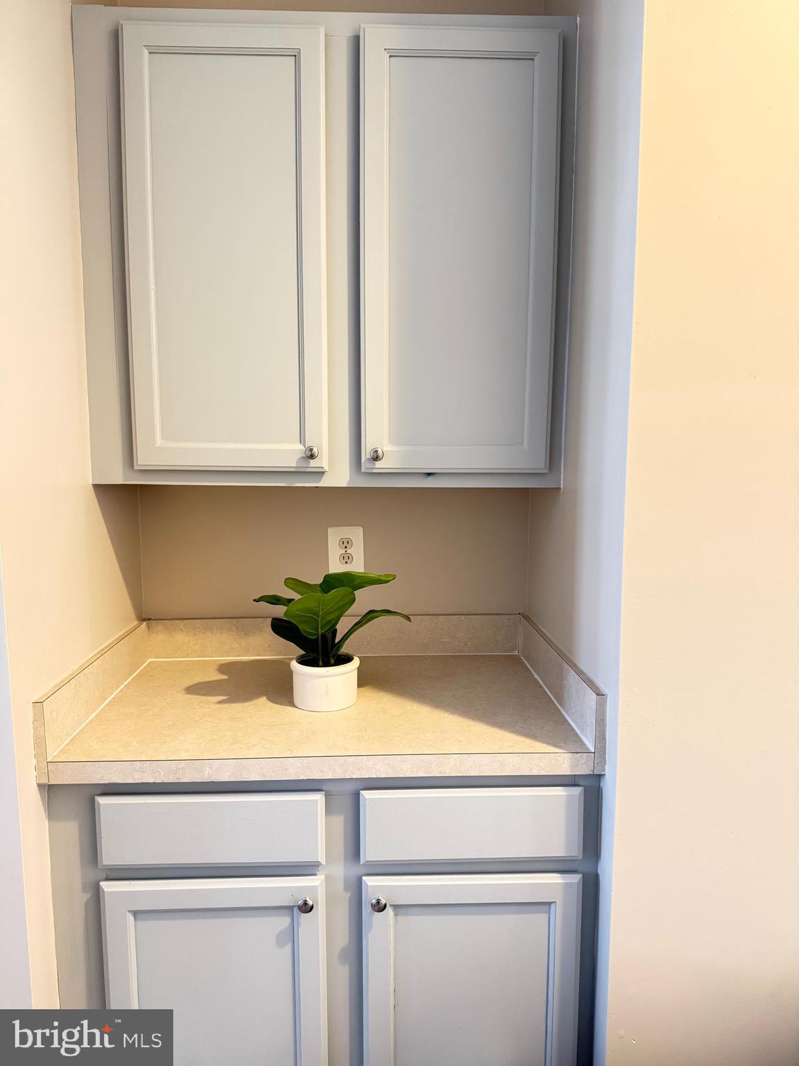 215 Seamaster Road Essex, MD 21221 - Photo 9 of 34 a bathroom with a sink and cabinets