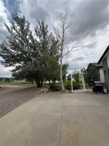a view of a car parked in front of a house