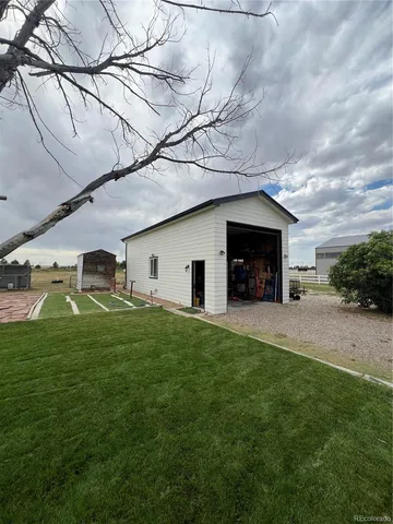 a view of a car in front of house